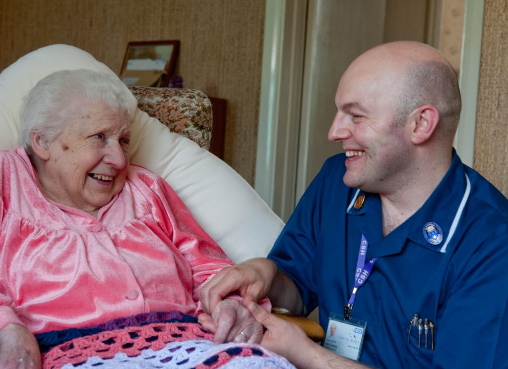 District Nurse with elderly femalepatient