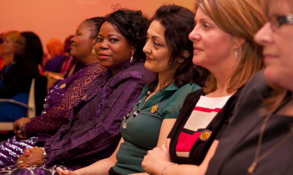 An audience of ethnically diverse Queen’s Nurses