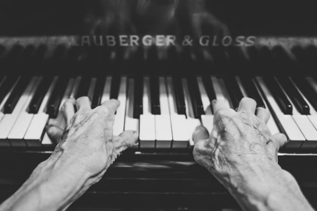 Hands playing piano
