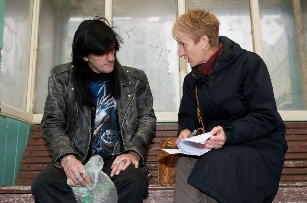 Nurse talking to a homeless man