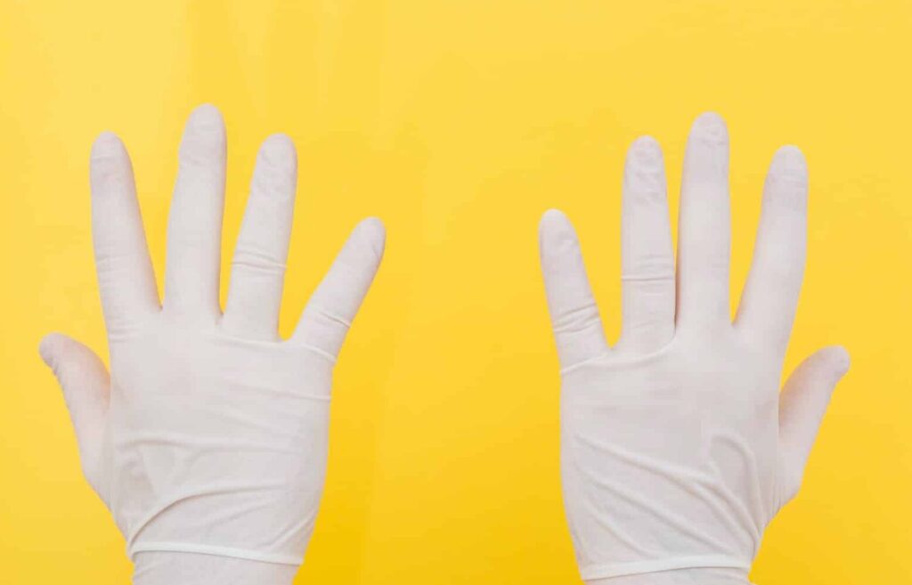 Hands in gloves