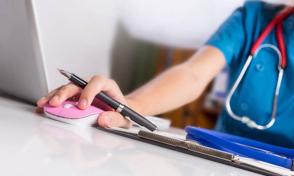 A nurse using a computer